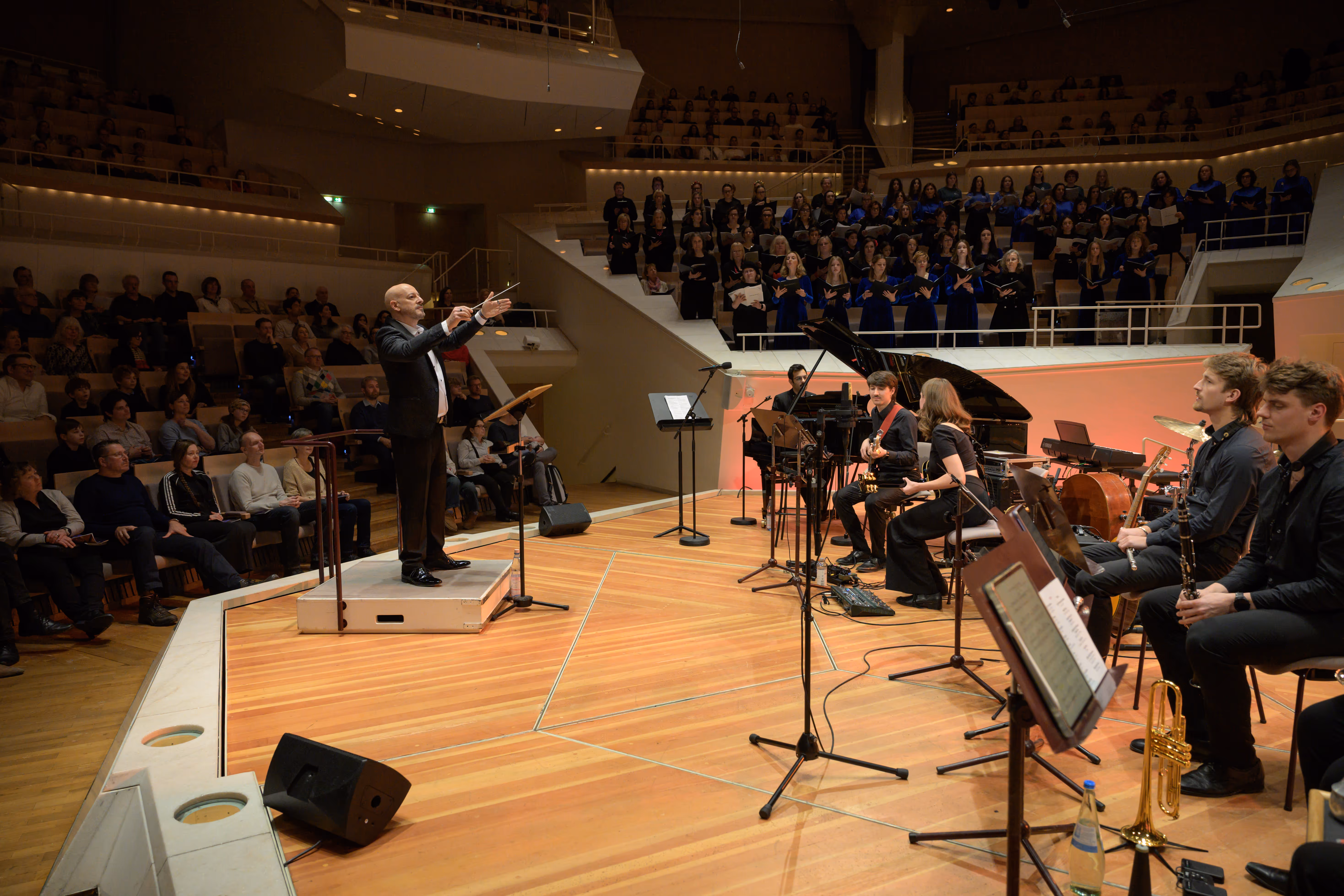 Russell Scott conducting a live concert